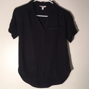 Black collared short sleeved button-up.